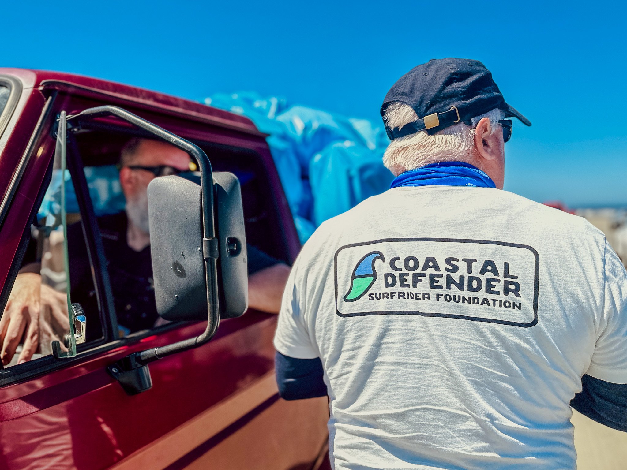 Volunteer Wearing Surfriger Gear (July 5, 2024)